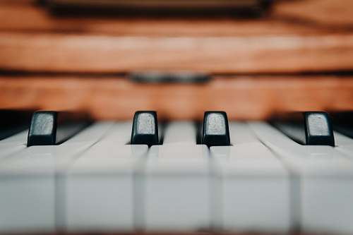 computer keyboard selective focus photography of piano keys electronics